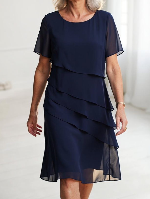 Julia – Abito elegante e fluido con volant