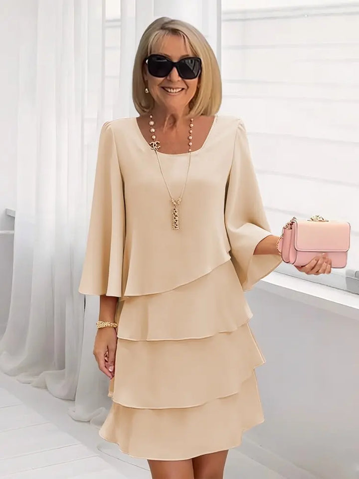Elsa – Abito elegante e fluido con volant