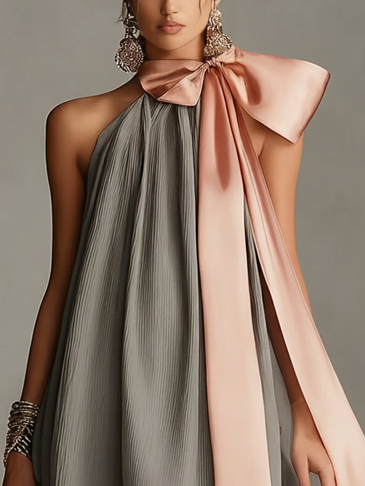 Beatrice | Mini abito grigio in raso con fiocco rosa e pizzo